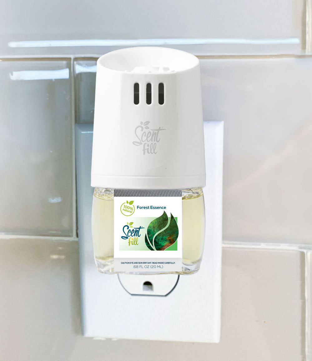 100% Natural Plug in Air Freshener Forest Essence plugged into warmer home fragrance