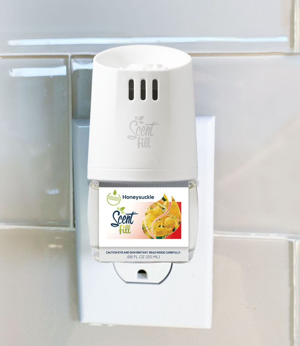 Natural Honeysuckle plug in air freshener plugged into a scent fill warmer