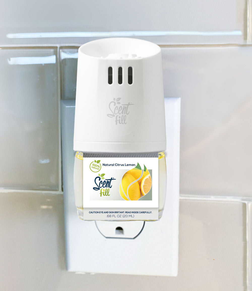 Lemon Citrus 100% Natural Plug in Refill Air Freshener plugged into warmer