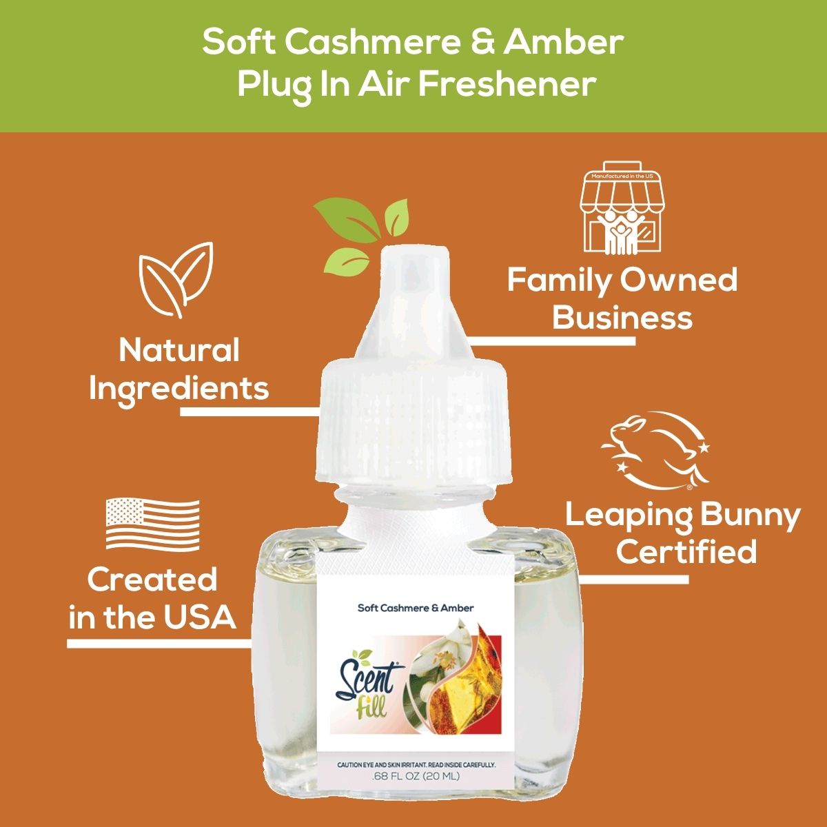 Promotional graphic for Soft Cashmere & Amber plug-in air freshener showing the refill bottle centered on a green and warm amber background with callouts for natural ingredients, family owned business, created in the USA, and Leaping Bunny certified.