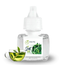 Scent Fill Green Tea plug-in air freshener refill bottle shown with a cup of green tea and tea leaves on a white background.