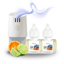 Scent Fill diffuser with two refills and citrus fruits on a white background