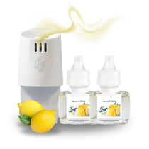 White plug-in diffuser with two Lemon Citrus refill bottles, styled with fresh lemons and a soft yellow scent wave drifting above.