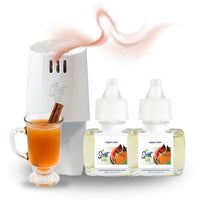 Scent Fill plug-in diffuser with two Apple Cider refill bottles displayed beside a glass mug of cider with a cinnamon stick, with a soft warm scent trail rising above.
