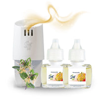 Scent Fill plug-in diffuser with two Honeysuckle fragrance refill bottles and honeysuckle flowers, with a soft golden scent trail above the diffuser.