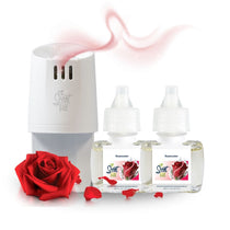 Scent Fill plug-in diffuser with two Rosewater fragrance refill bottles on a white background, paired with a red rose and scattered rose petals, with a soft rosy scent trail rising above the diffuser.