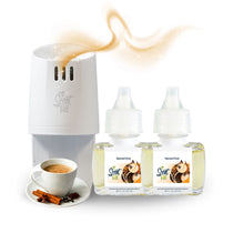 Scent Fill plug-in diffuser with two Spiced Chai fragrance refill bottles and a cup of chai with cinnamon sticks, with a soft golden scent trail above the diffuser.