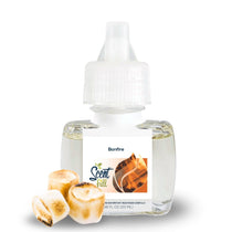 Scent Fill Bonfire fragrance refill bottle on a white background with toasted marshmallows placed in front.