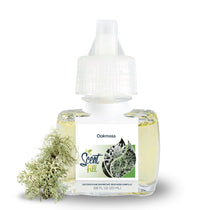 Scent Fill Oakmoss fragrance refill bottle on a white background with a piece of soft green-gray moss placed beside it.