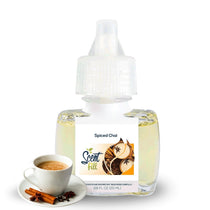 Scent Fill Spiced Chai plug-in refill bottle with a cup of chai and cinnamon sticks on a light background.