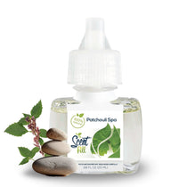 Scent Fill Patchouli Spa plug-in refill bottle with stacked spa stones and green botanical sprigs on a light background.